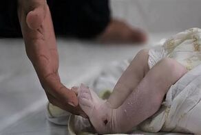 فیلم صحنه قتل دردناک نوزاد چند روزه توسط پدرش و پرت جنازه اش از پنجره آپارتمان به بیرون